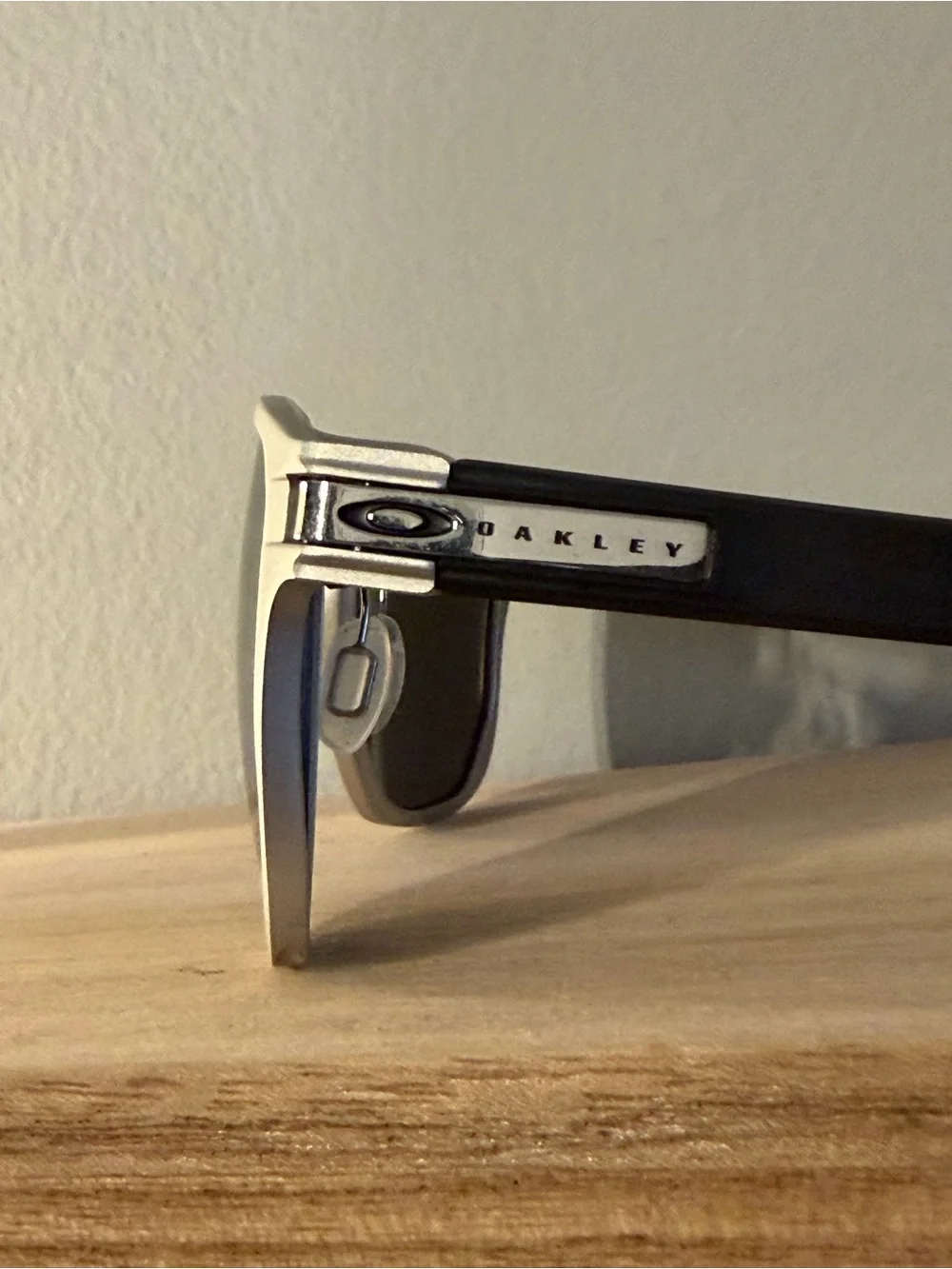 Oakley Latch Alpha Silver Framed Sunglasses with Dark Lenses